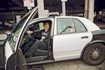 Policemen let Jiang sit in their car