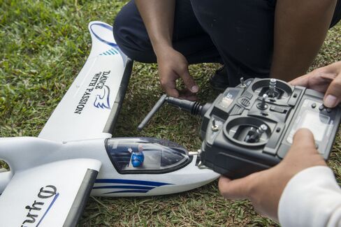 A drone being checked and callibrated pre-flight in Sembawa, Indonesia. Photographer: Rony Zakaria/Bloomberg