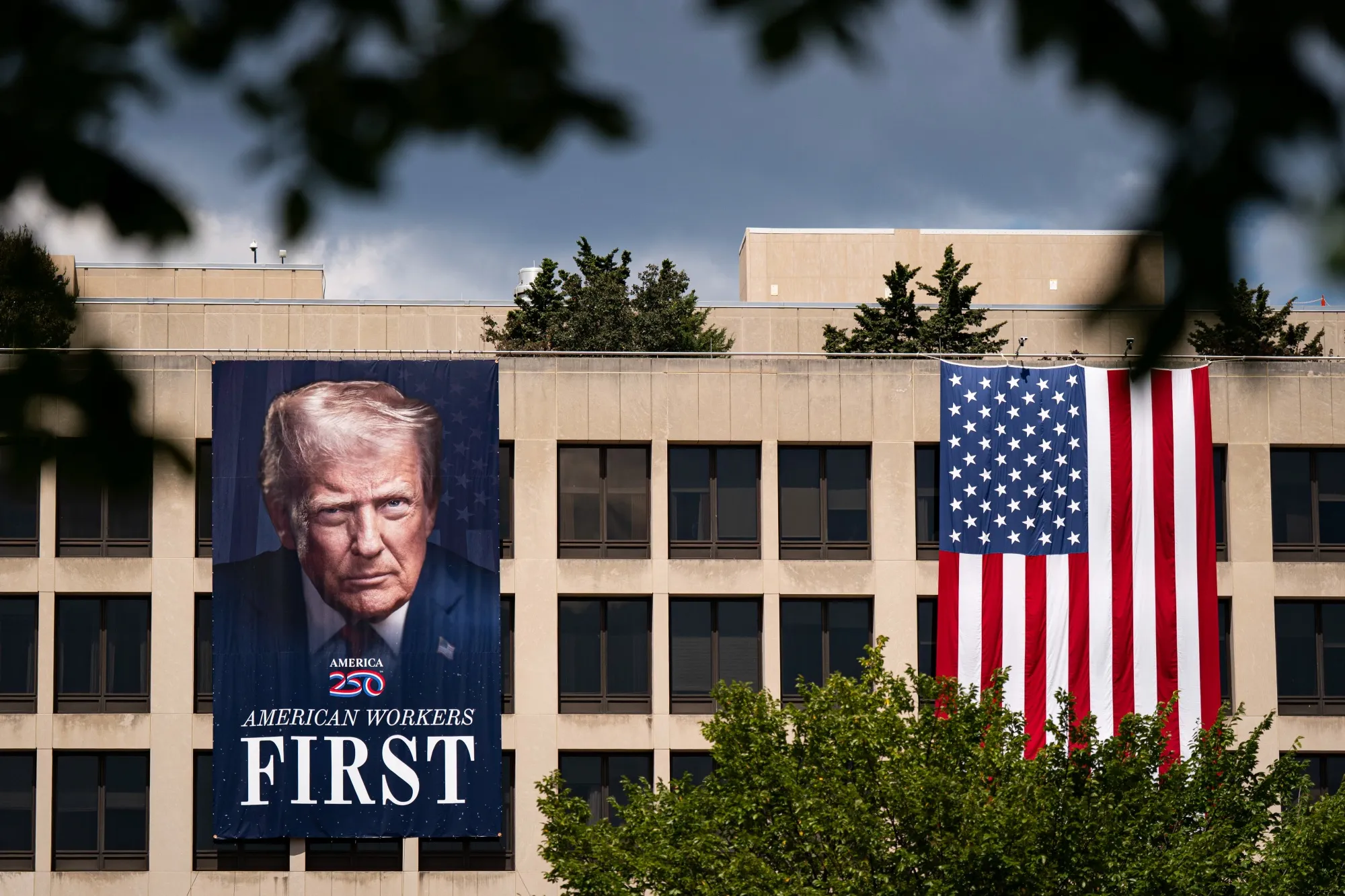 A banner of US President Donald Trump at the US Department of Labor headquarters in Washington.