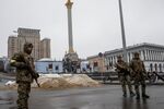 Members of Ukraine's Territorial Defense stand guard in Independence Square in Kyiv, on March 3.
