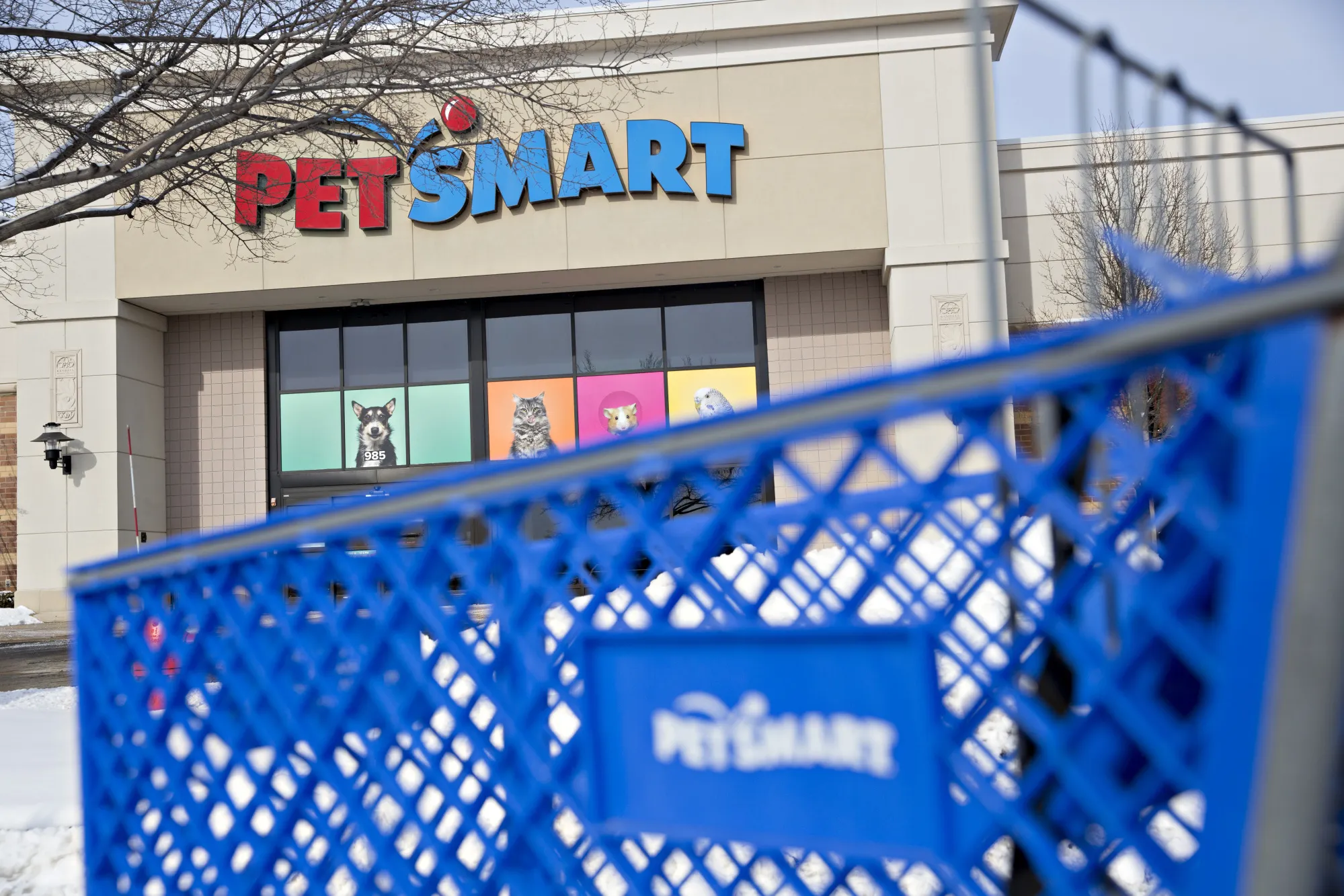A shopping cart sits outside of a PetSmart Inc. store in Yorkville, Illinois.