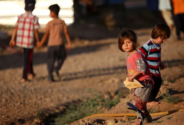 Displaced Iraqis at a camp near Erbil.
