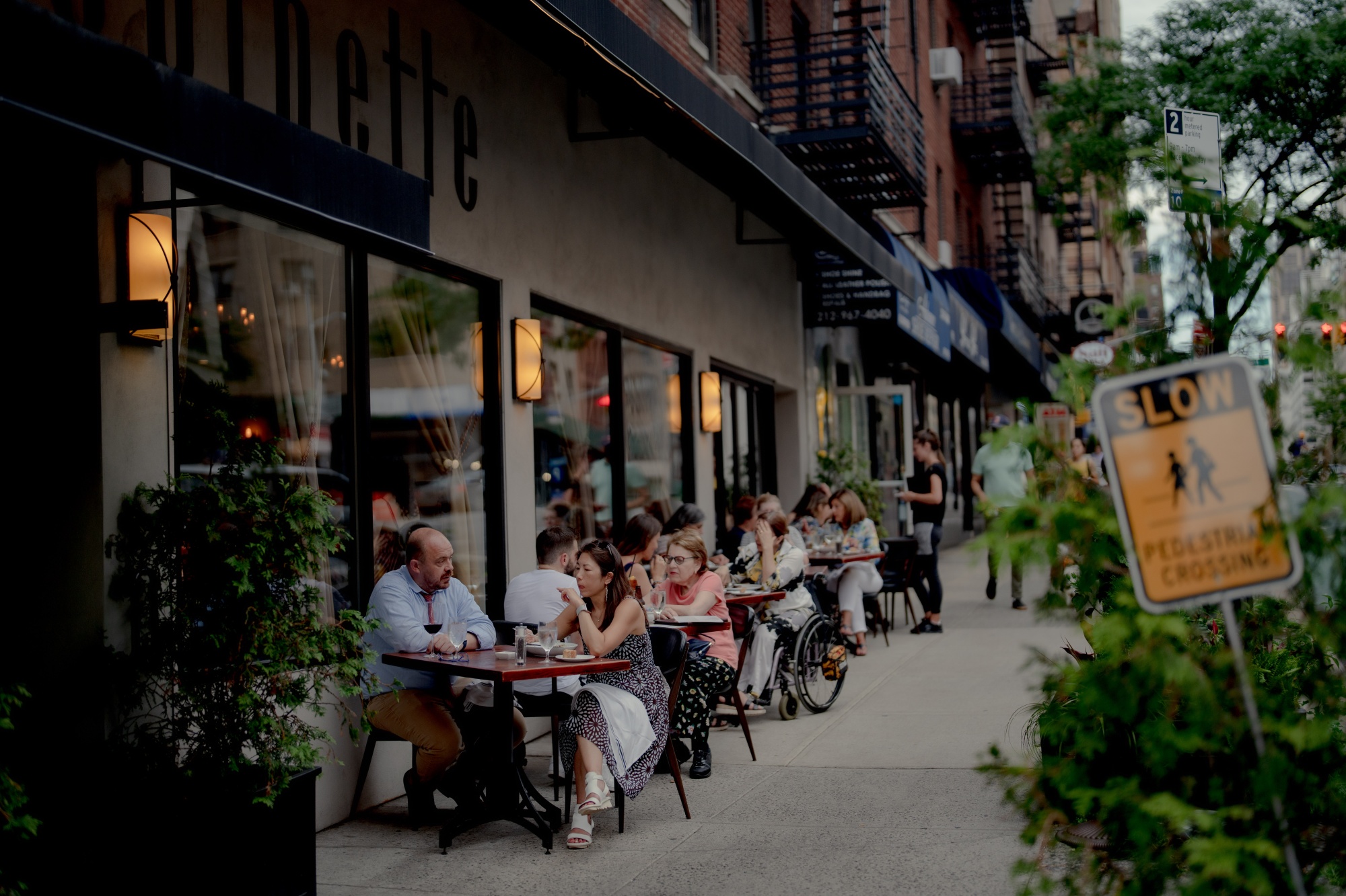 Customers dine outside at Copinette restaurant in New York.
