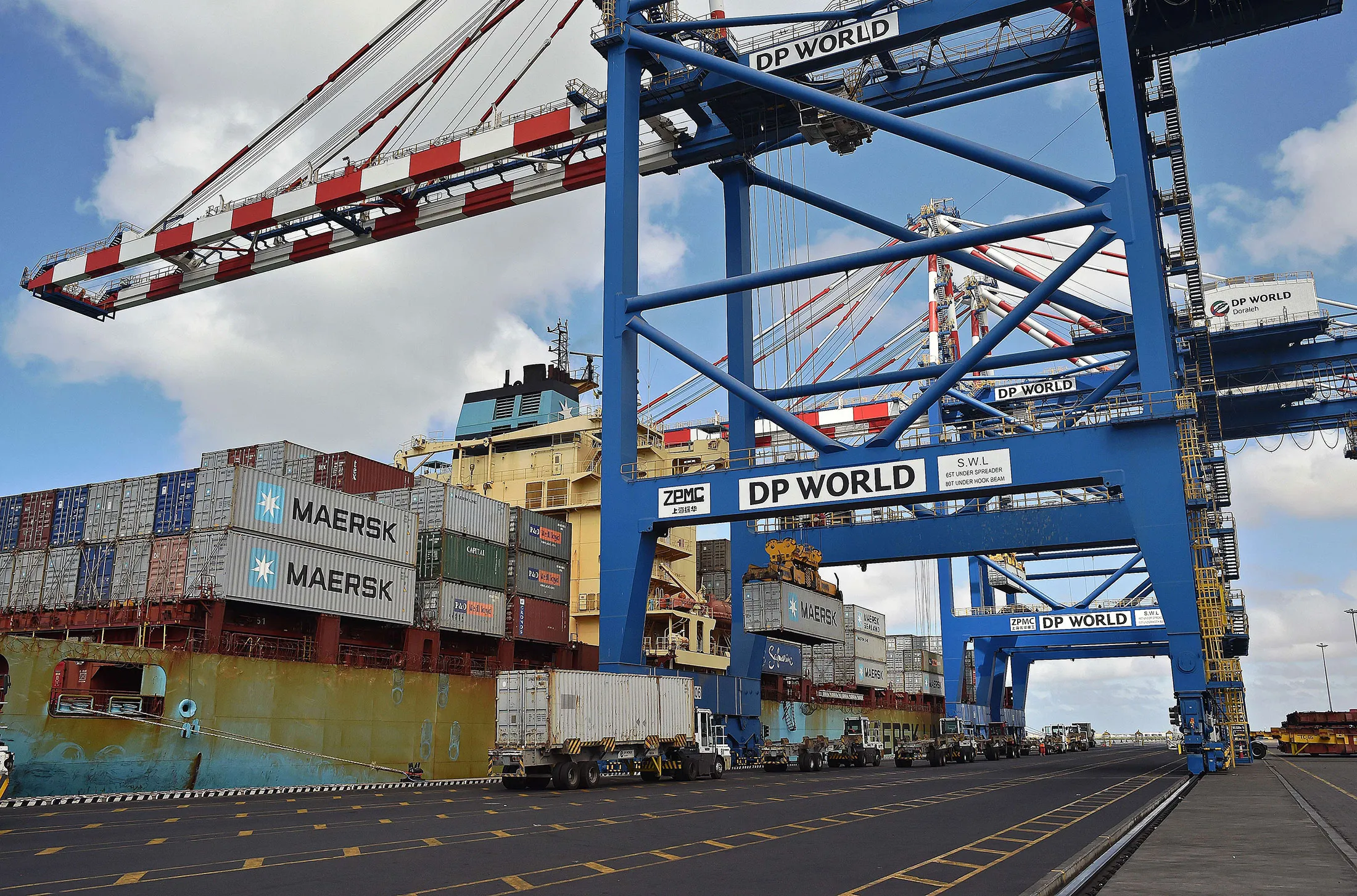Cranes and trucks get ready near a container ship in Doraleh harbour in Djibouti.