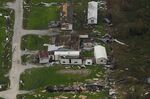 In this aerial photo, the remains of destroyed homes are seen in the aftermath of Hurricane Ida, Sept. 6, 2021, in Lafitte, La. Damage wrought by Hurricane Ida in the U.S. state of Louisiana and the flash floods that hit Europe last summer have helped make 2021 one of the most expensive years for natural disasters. Reinsurance company Munich Re said Monday, Jan. 10, 2022 that overall economic losses from natural disasters worldwide last year reached $280 billion. (AP Photo/Matt Slocum, file)