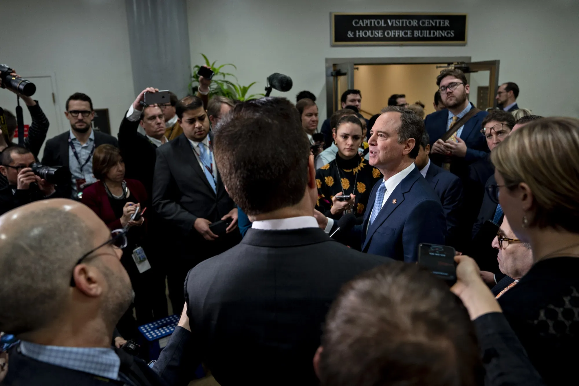 Adam Schiff, right, speaks during a news conference in the Senate Subway at the U.S. Capitol in Washington, D.C. on Jan. 24.