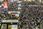 Travelers at Shanghai Hongqiao Railway Station ahead of the Golden Week holiday in Shanghai, on Sept. 30.
