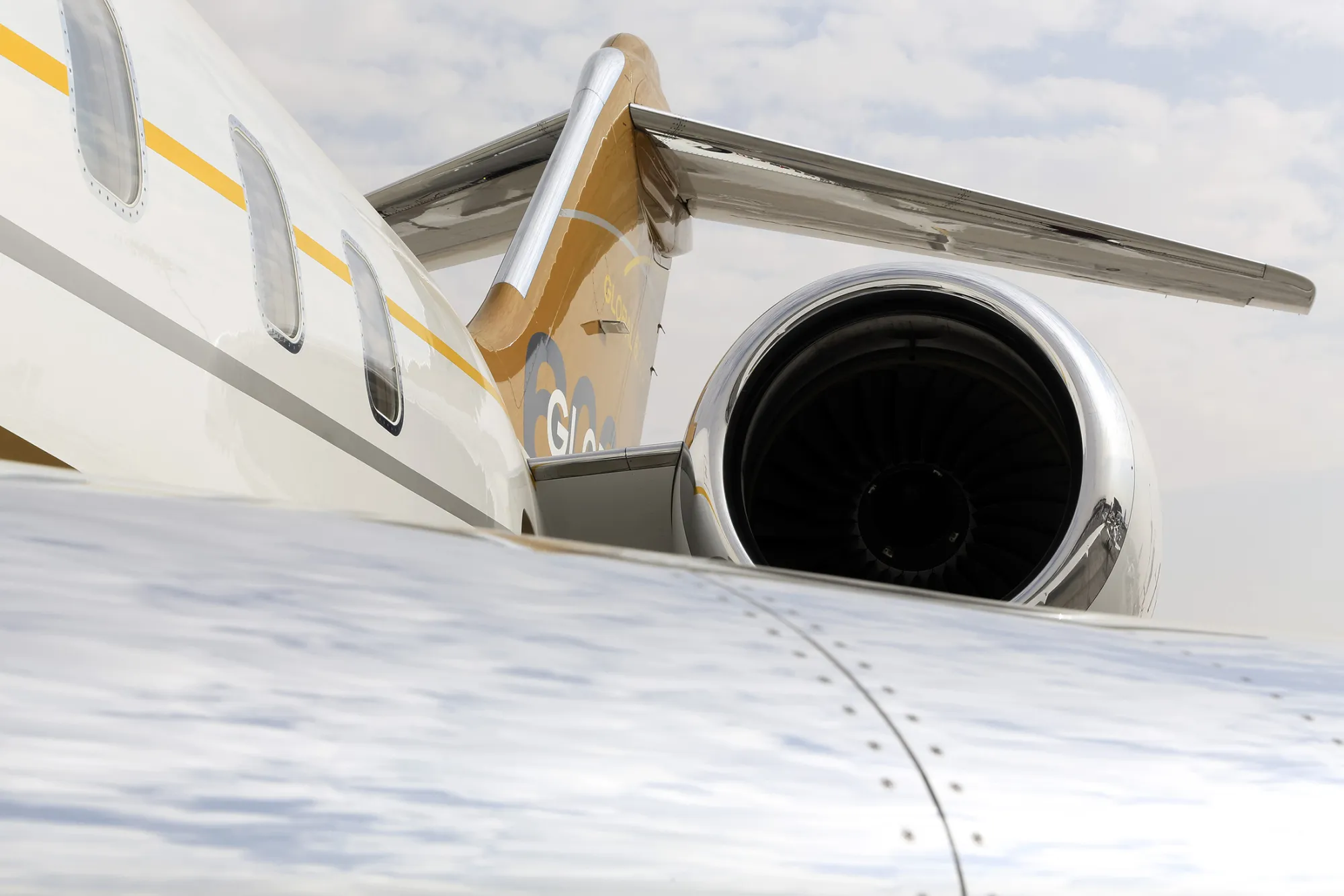 The engine of a Bombardier Global 6000 jet aircraft, manufactured by Bombardier Inc. aircraft, is seen on display during the 13th Dubai Airshow at Dubai World Central (DWC) in Dubai, United Arab Emirates, on Sunday, Nov. 17, 2013. The 13th edition of the biennial 2013 Dubai Airshow, the Middle East's leading aerospace event organized by F&amp;E Aerospace.
