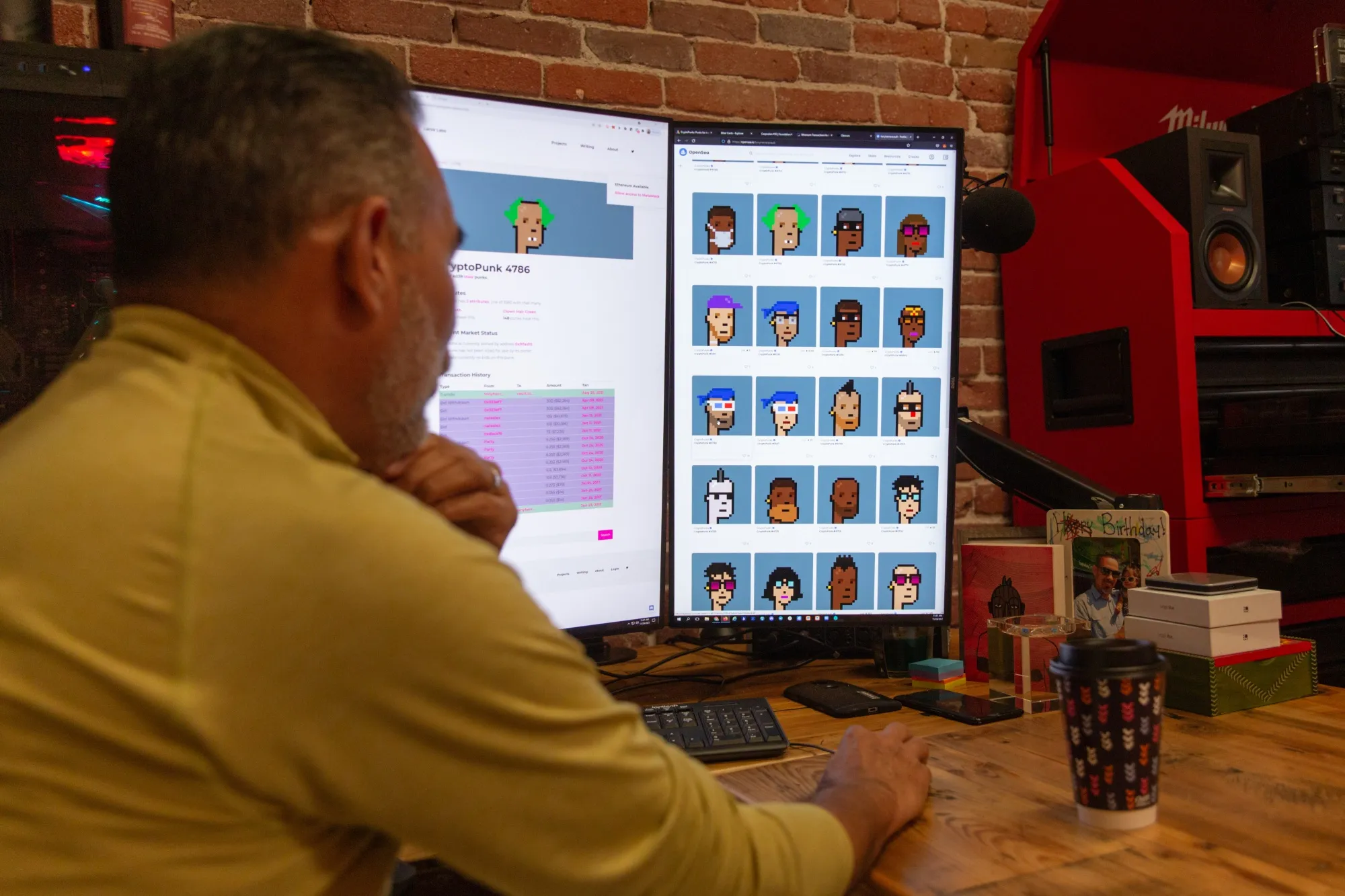 Tony Herrera looks&nbsp;through his NFTs at his office in Whittier, Calif.