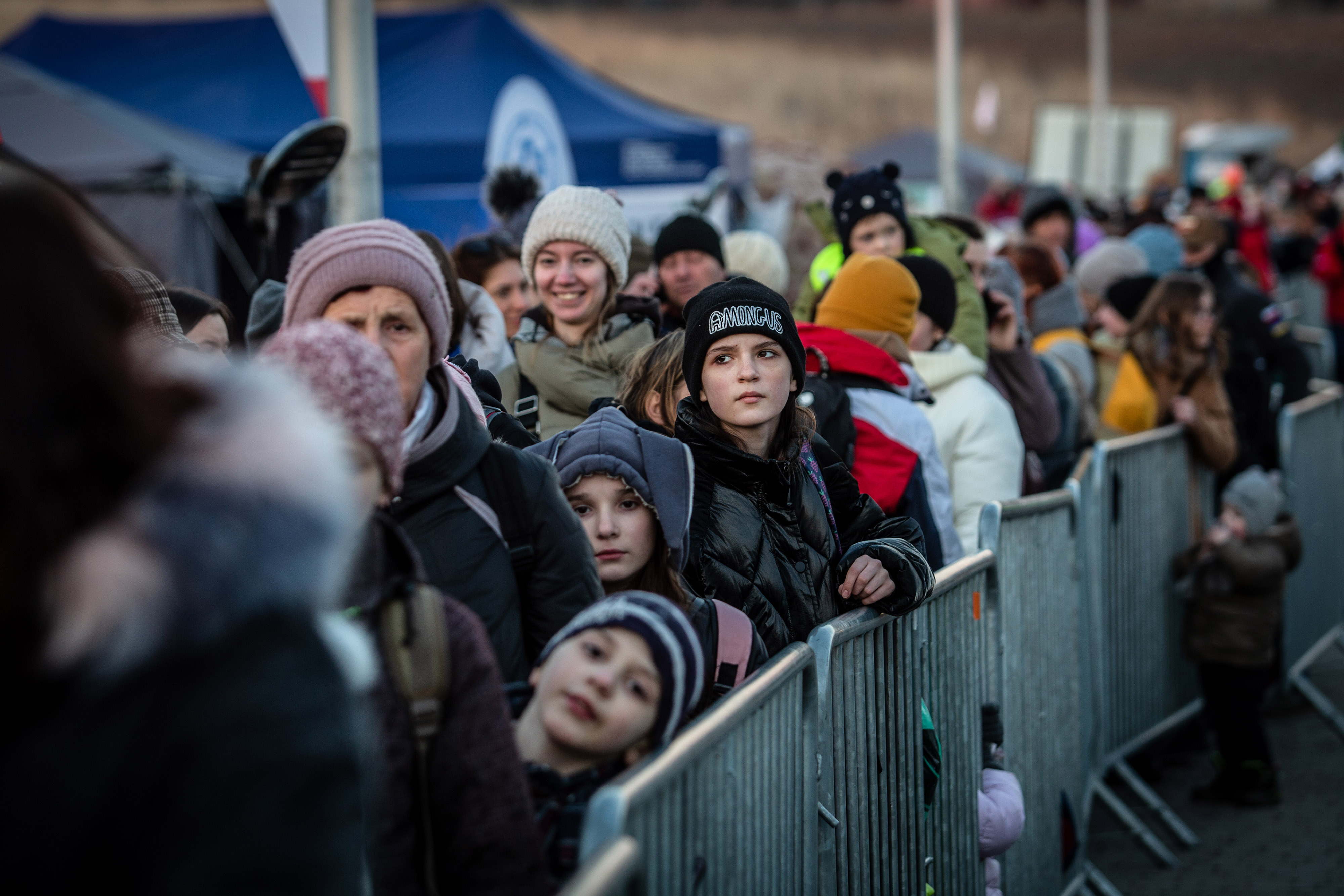 Ukrainian refugees at the Medyka border crossing in Poland&nbsp;last March. The International Criminal Court issued an arrest warrant for Vladimir Putin tied to the alleged abduction of Ukrainian children over the course of the year-long war.