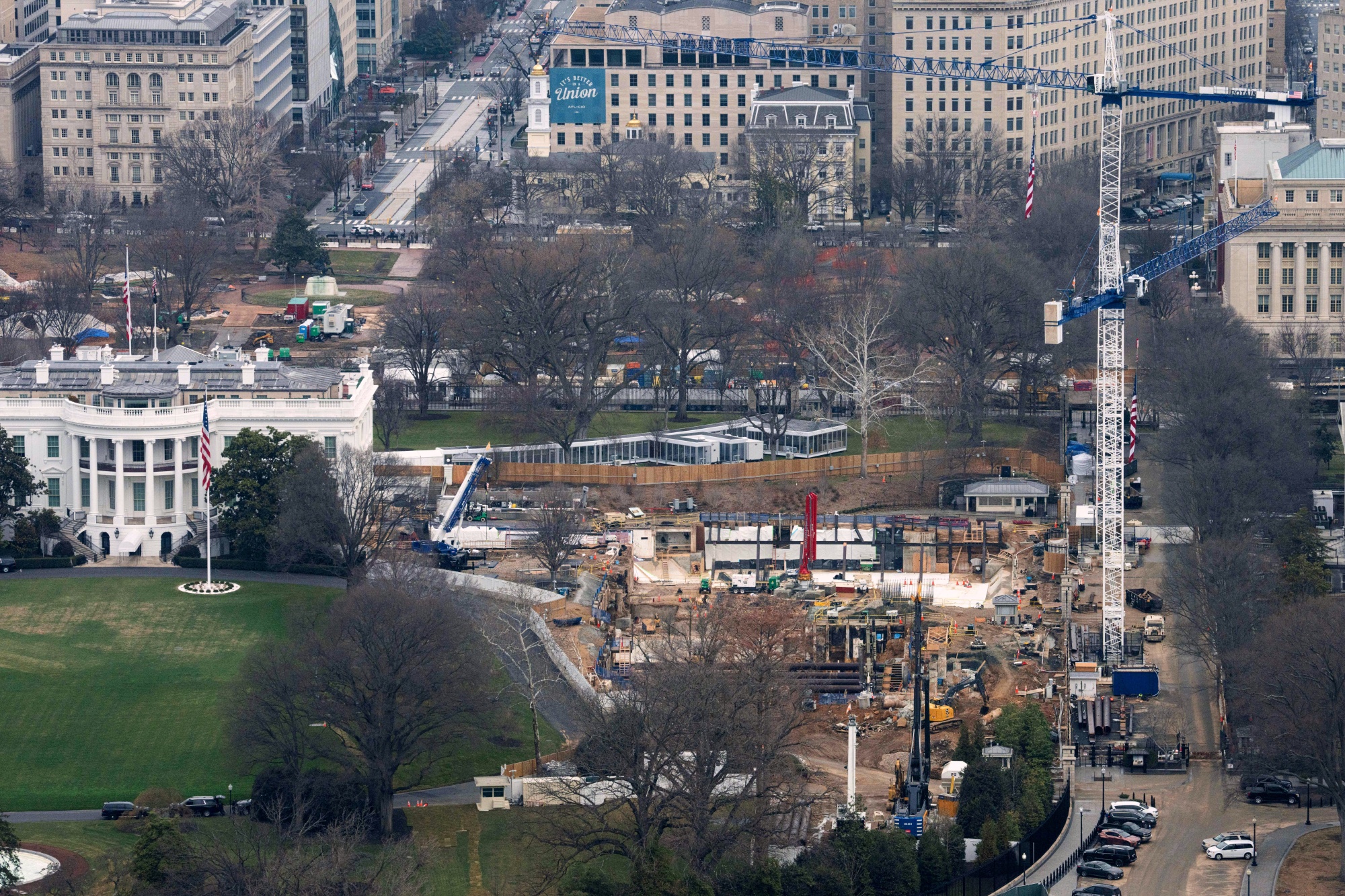 WASHINGTON, DC - MARCH 8: Construction work continues on President Trump's White House Ballroom on the site of the former East Wing of the White House, seen from the Washington Monument on March 8, 2026 in Washington, DC. The National Capital Planning Commission postponed a vote on final approval of the ballroom after receiving an overwhelming amount of negative public comments. (Photo by Aaron Schwartz/Getty Images)
