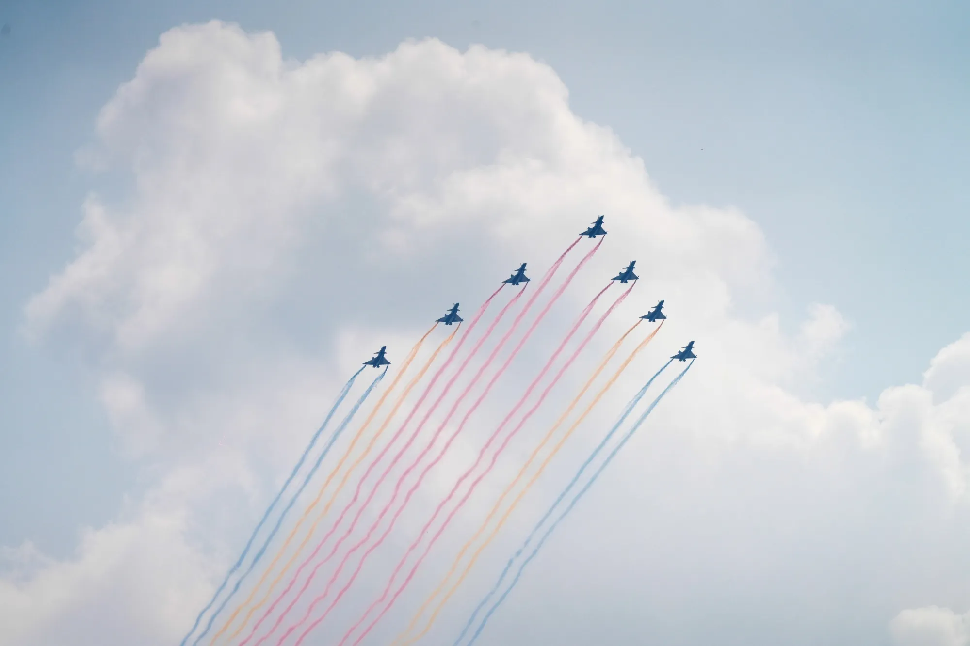Members of the People's Liberation Army Air Force fly J-10 fighter jets over Tiananmen Square during a military parade&nbsp;in Beijing on Sept. 3.