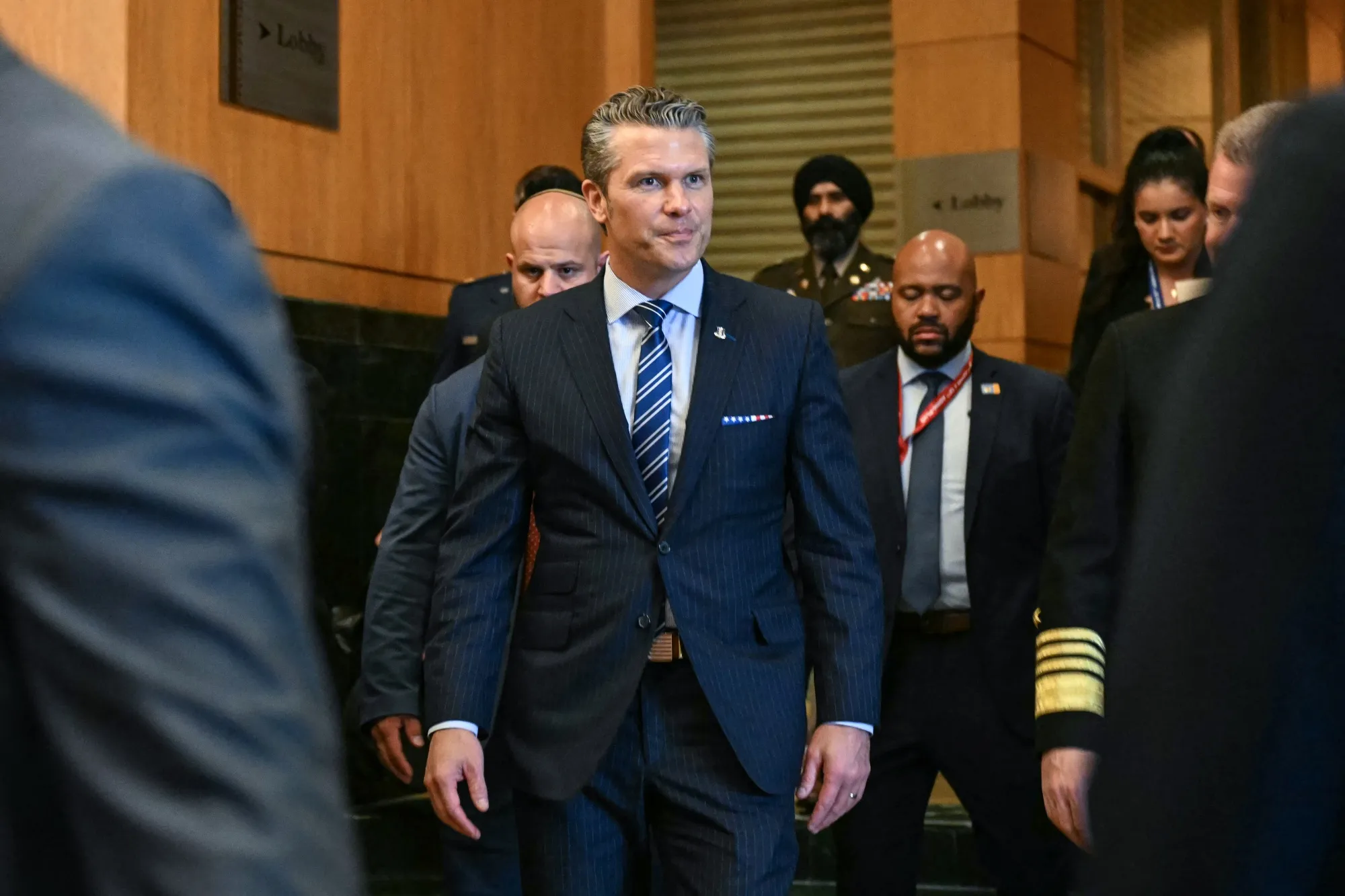 Hegseth and China's Defense Minister Meet After Trump-Xi Trade Truce - Bloomberg