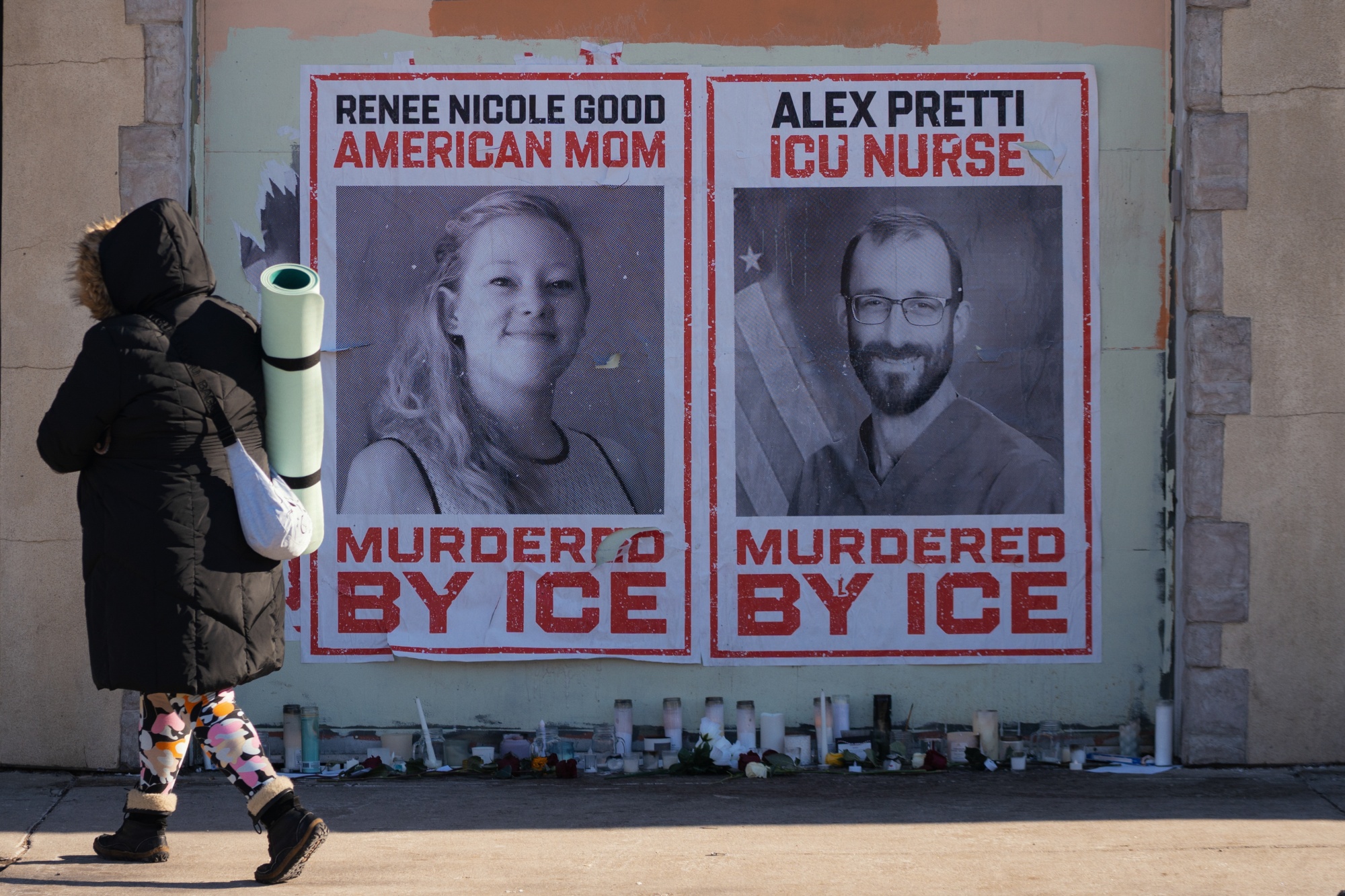 Posters displaying images of Renee Good and Alex Pretti in south Minneapolis, Minnesota, US, on Thursday, Jan. 29, 2026. White House Border Czar Tom Homan said the Trump administration will scale down operations in Minnesota and conduct targeted anti-immigration actions. Photographer: Ben Brewer/Bloomberg