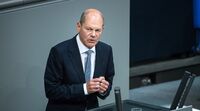 relates to Scholz Stands Firm in Second Debate in Germany