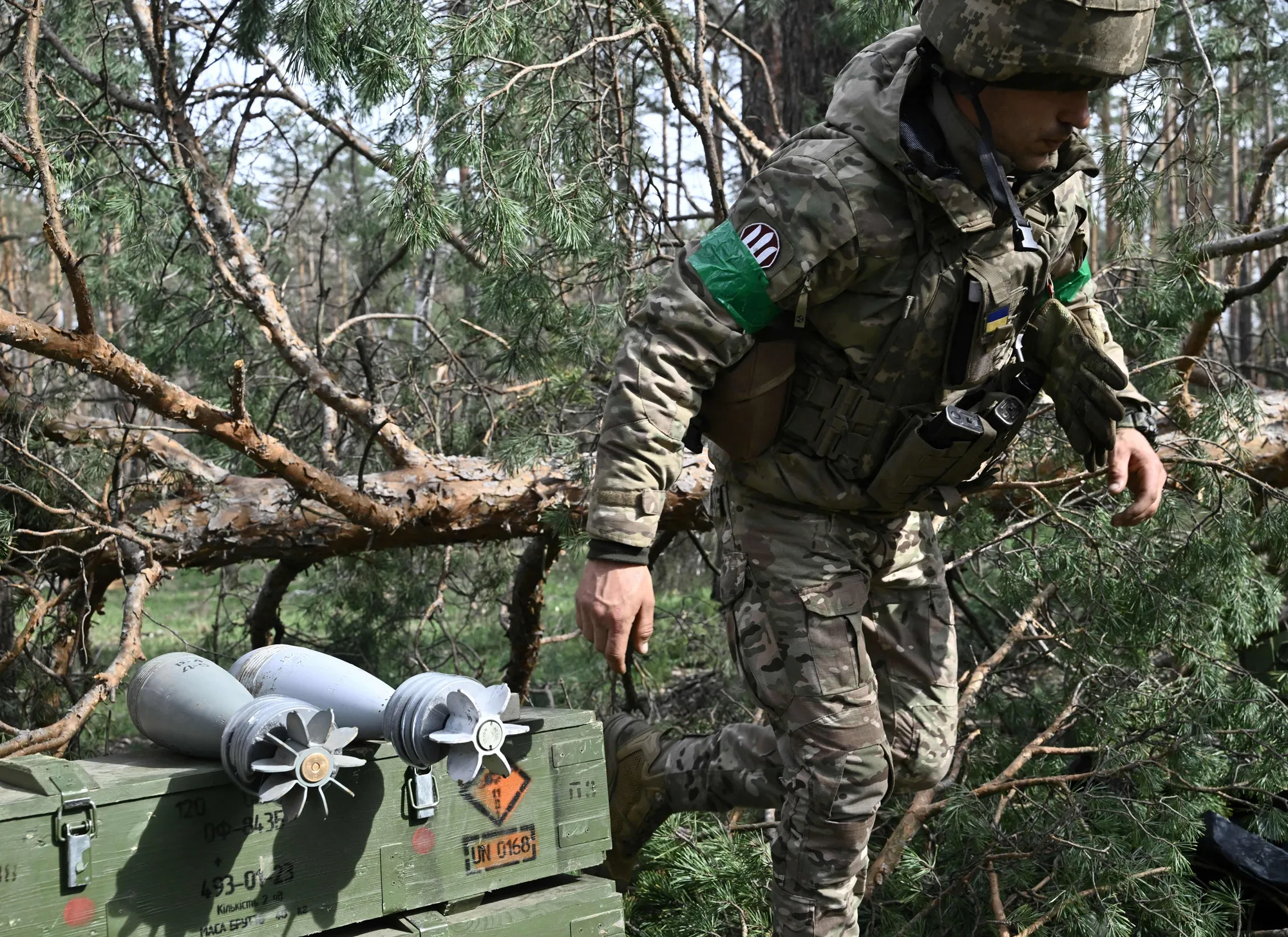 A Ukrainian serviceman prepares mortar shells in Donetsk region, Ukraine.