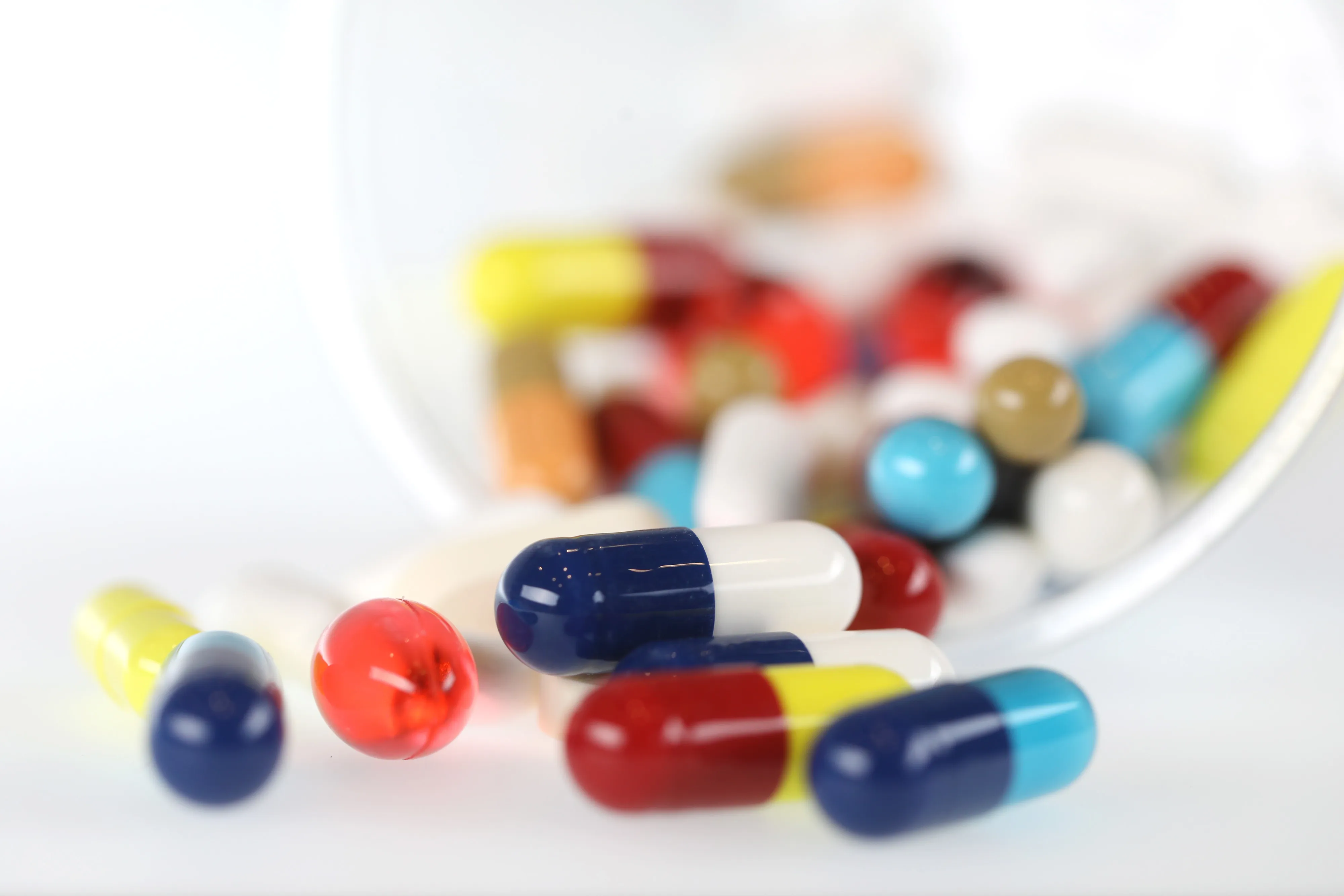 Brightly coloured pharmaceutical medication, including antibiotics, paracetamol, Ibuprofen and cold relief tablets, manufactured by a variety of companies sit in this arranged photograph in London, U.K., on Friday, April 27, 2018. Pharmaceutical companies may see approval times cut to 14 months vs. 19 and about $370 million of sales brought forward per antibiotic after global regulators aligned rules to combat bacterial resistance.