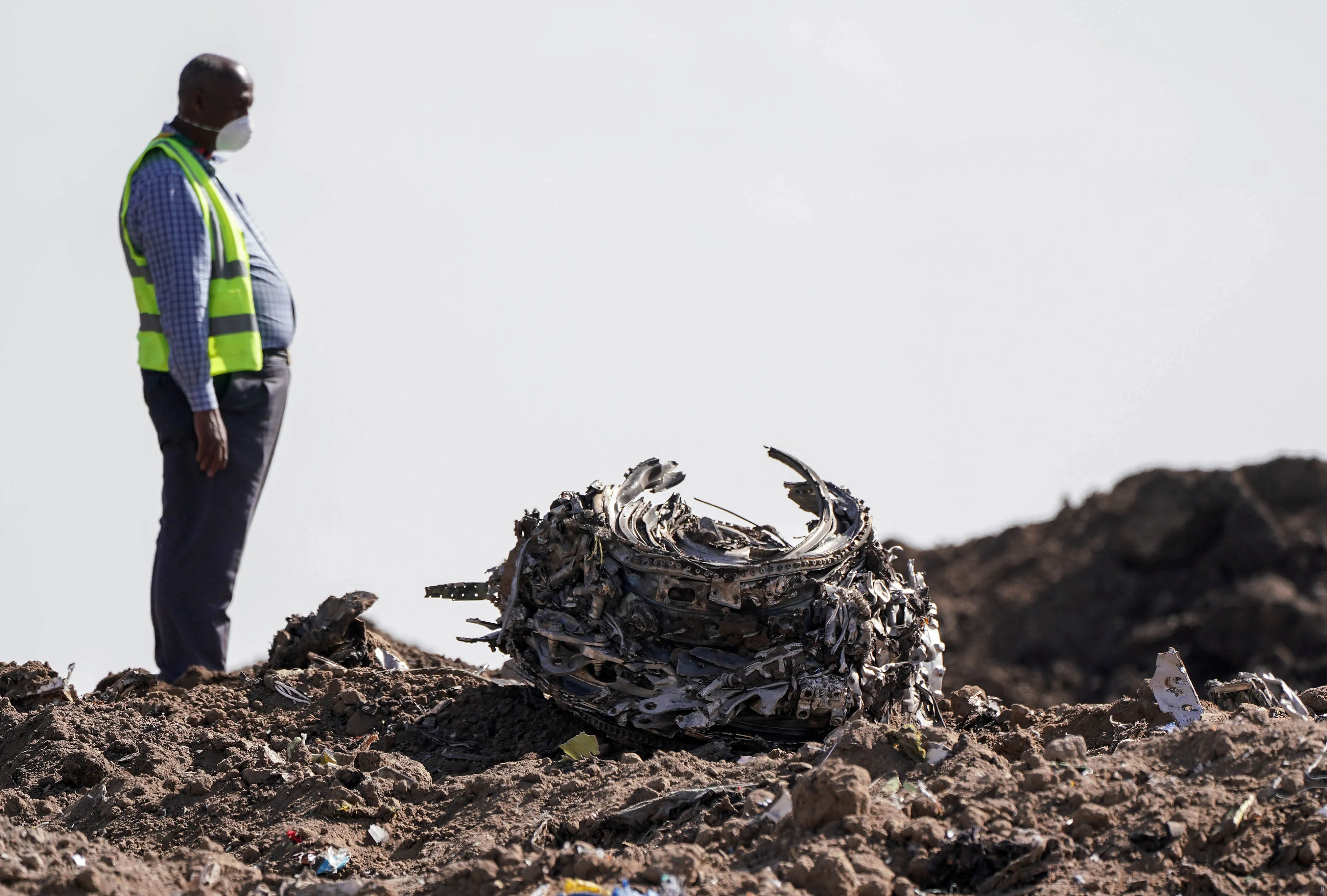 A recovery worker at scene of the Ethiopian Airlines Flight 302 crash on March 13, 2019.