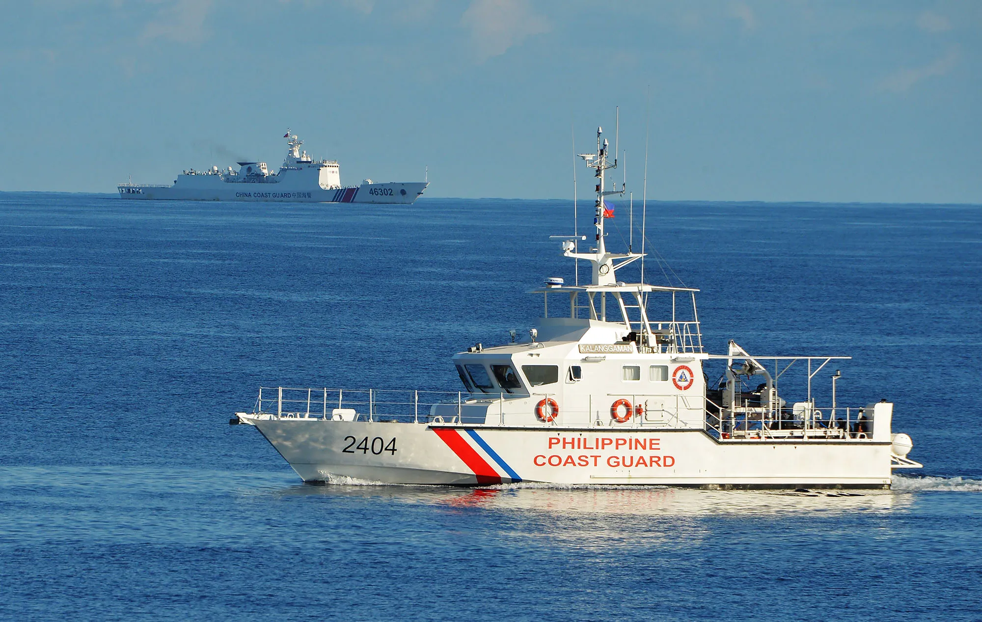 Philippine and Chinese coastguard ships in the South China Sea in 2019.