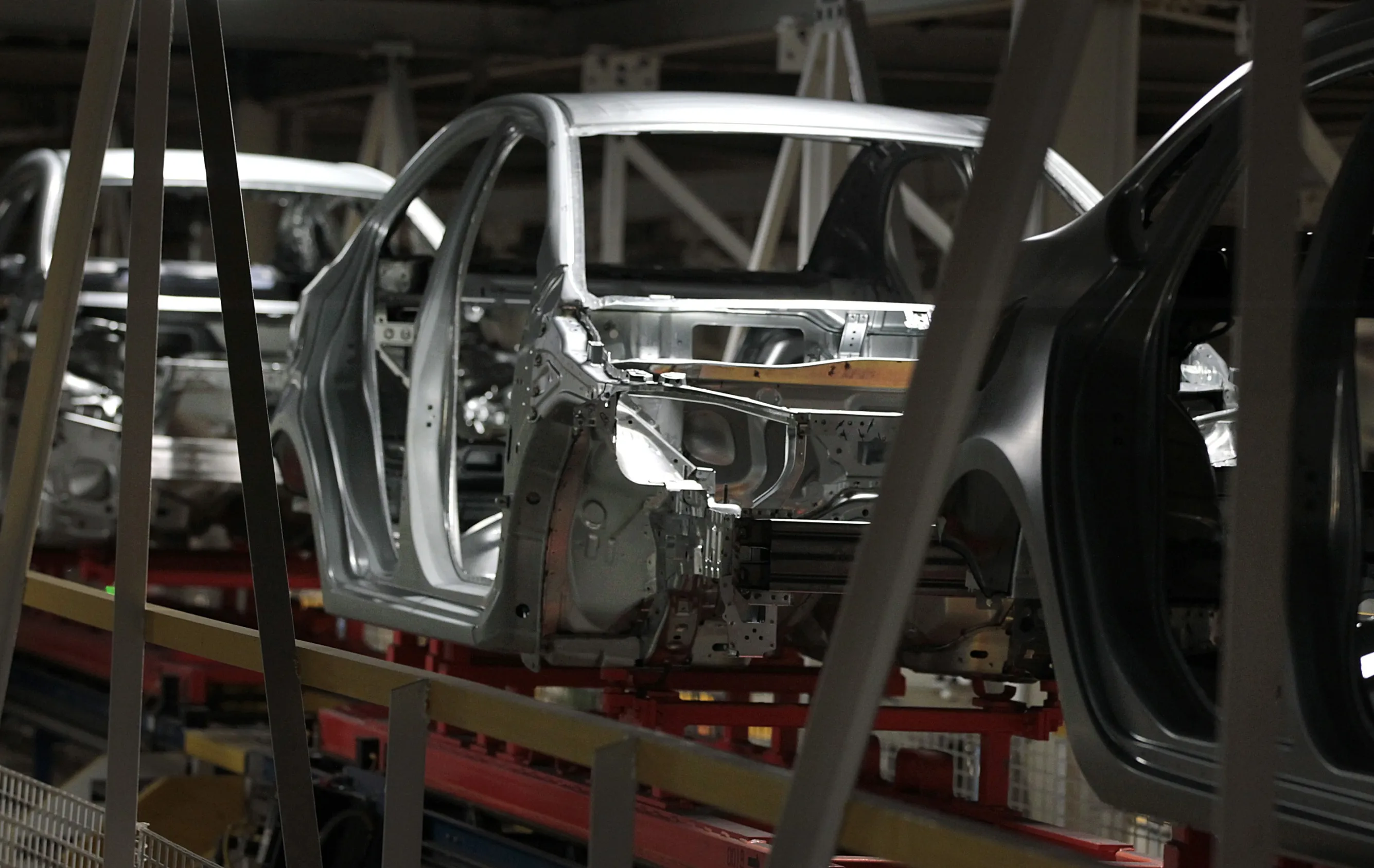 General Motors Co.&nbsp;Chevrolet Sonic and Buick Verano vehicles move along the body shop production line at company's assembly plant in Lake Orion, Michigan.