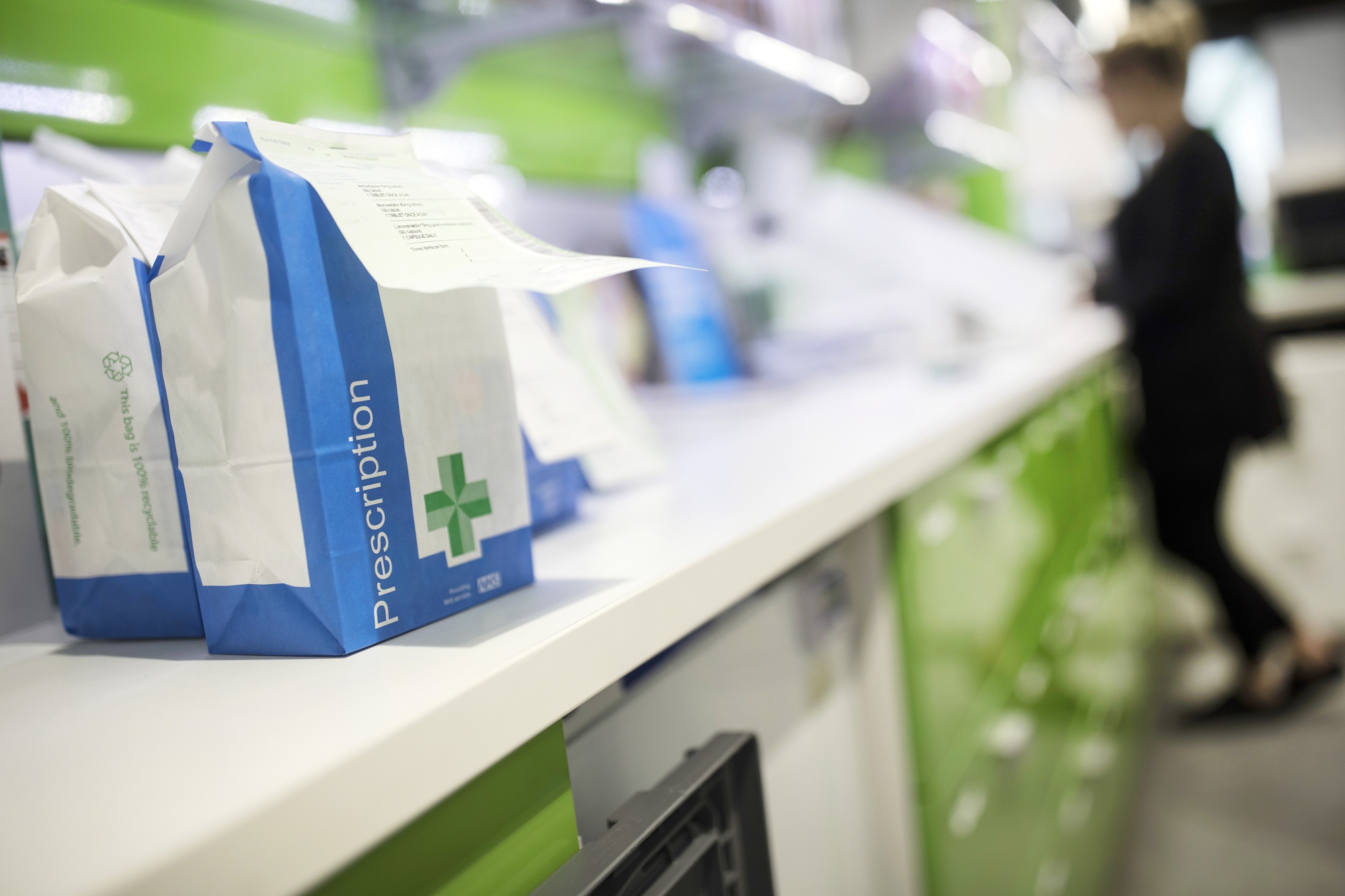 Bags of completed medical prescriptions at a pharmacy in Longfield, Kent.