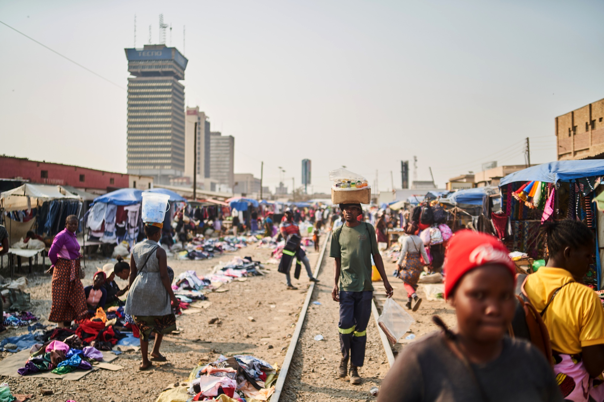 Traders at a market along a railway line in Lusaka, Zambia.