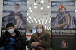 An elderly woman&nbsp;waits in a medical observation area after being vaccinated&nbsp;at a hospital in Bucharest.