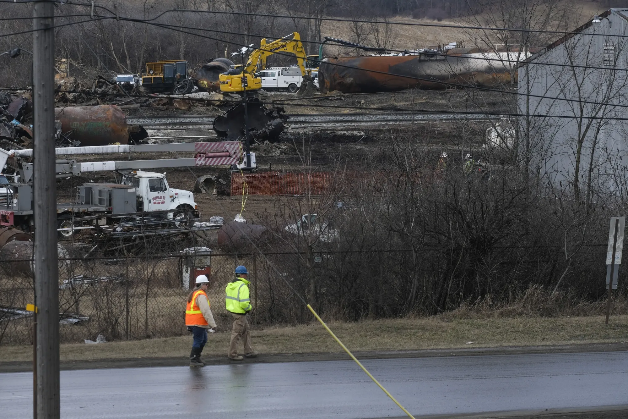 Work crews&nbsp;remove and dispose of wreckage from a Norfolk Southern train derailment in East Palestine, Ohio, on Feb. 20, 2023.
