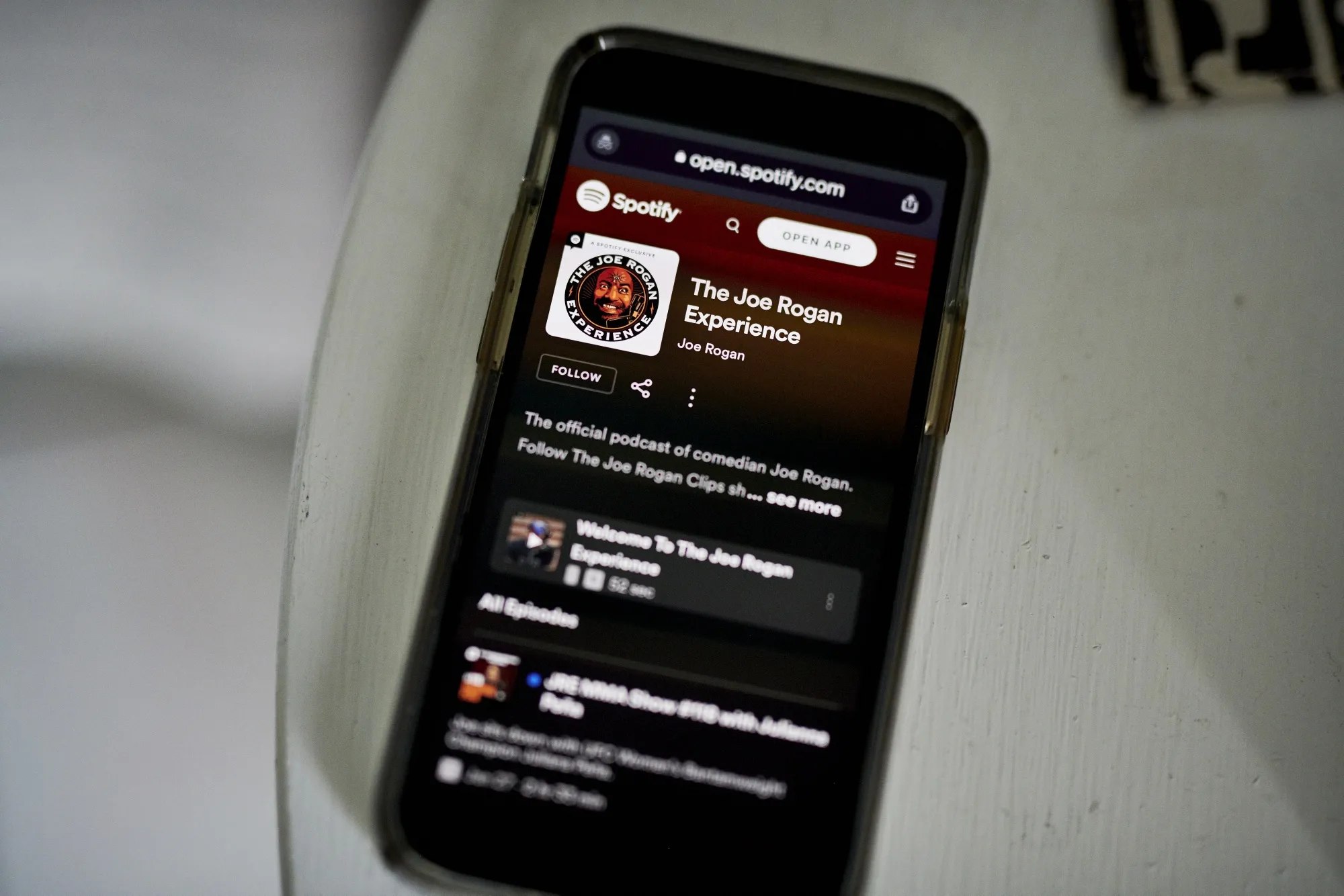 The Joe Rogan Experience Spotify website page on a smartphone in Saint Thomas, U.S. Virgin Islands, on Sunday, January 30, 2022. Spotify Technology SA outlined steps it will take to halt the spread of misleading information about Covid-19 on its audio-streaming service in an attempt to quell a growing controversy over its support for the podcast host Joe Rogan.