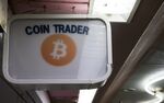 Signage is displayed outside the Coin Trader bitcoin retail store in Tokyo, Japan.
