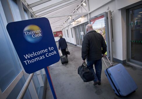 Thomas Cook Check-In Desks As Shares Slide 75 Percent