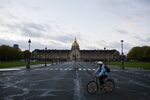 A cyclist passes Les Invalides in Paris on Nov. 2.