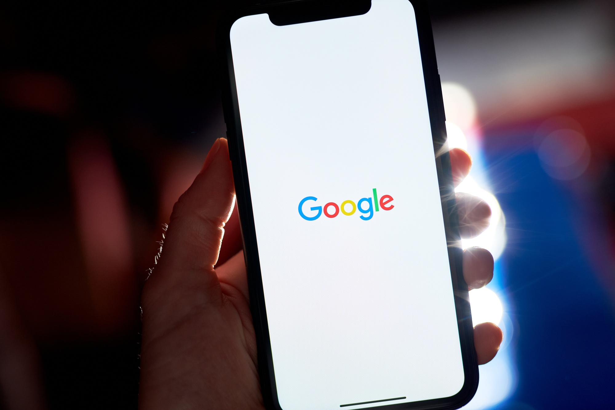 The Google logo on a smartphone.