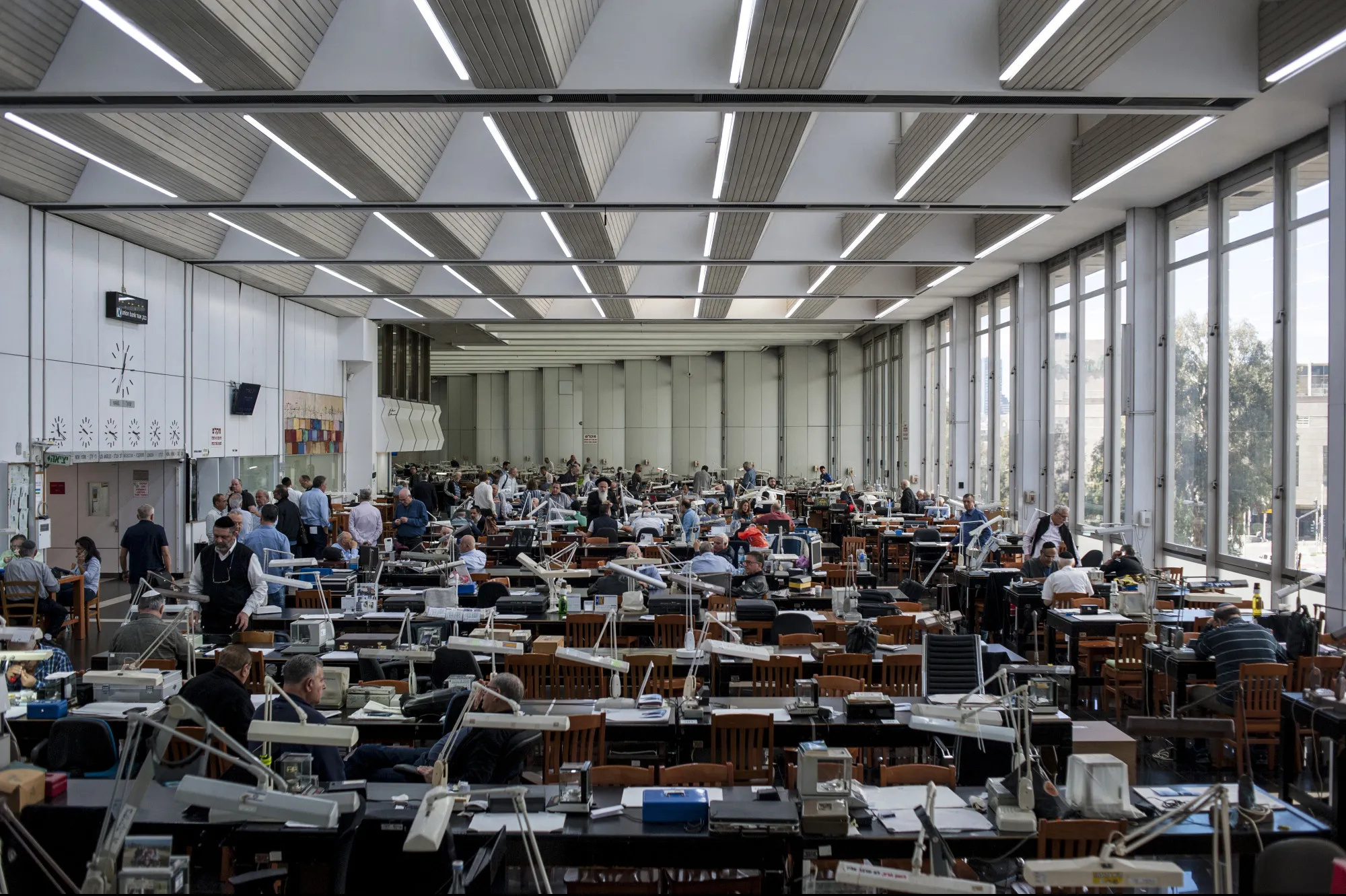 Diamond traders and jewelers work inside the Israel Diamond Exchange complex in Tel Aviv, Israel.