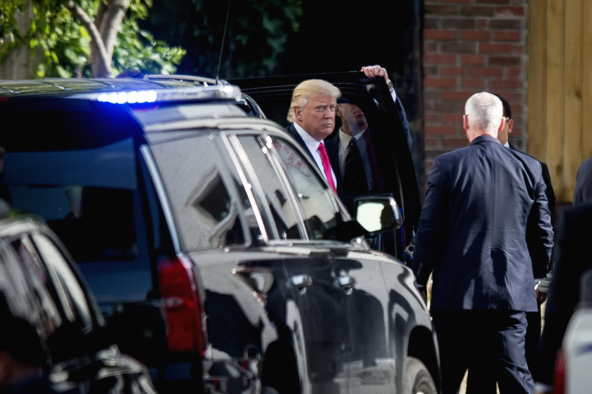 Donald Trump, presumptive Republican presidential nominee, arrives to meet with House Republicans at the Capitol Hill Club in Washington, D.C., U.S., on Thursday, July 7, 2016. Some House Republicans came away from the meeting saying he can unify their party for the November election, though some members stayed away from the high-profile summit. Photographer: Pete Marovich/Bloomberg
