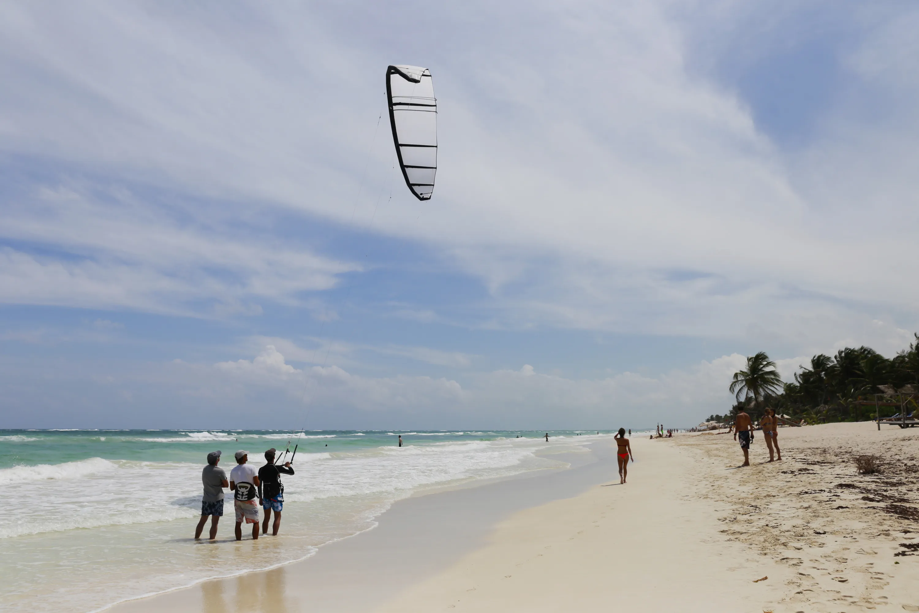Visitors enjoy the beach in Tulum, Mexico.