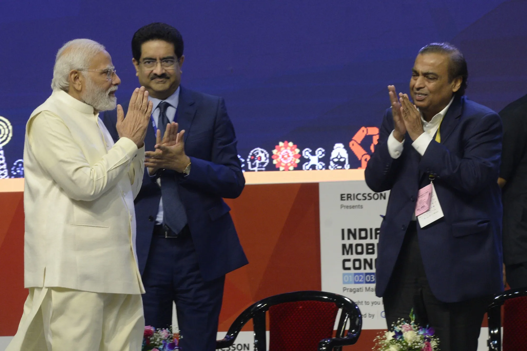 Narendra Modi and tycoons Kumar Mangalam Birla and Mukesh Ambani.