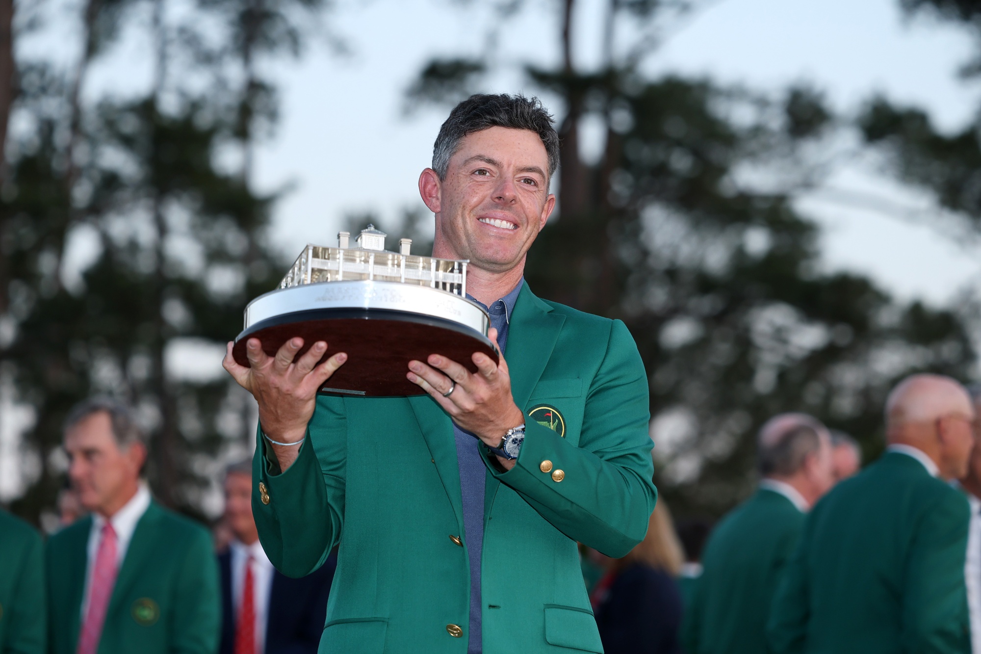 Rory McIlroy of Northern Ireland poses with the Masters trophy during the Green Jacket Ceremony after winning the 2025 Masters Tournament at Augusta National Golf Club on April 13, 2025 in Augusta, Georgia. Photographer: Richard Heathcote/Getty Images