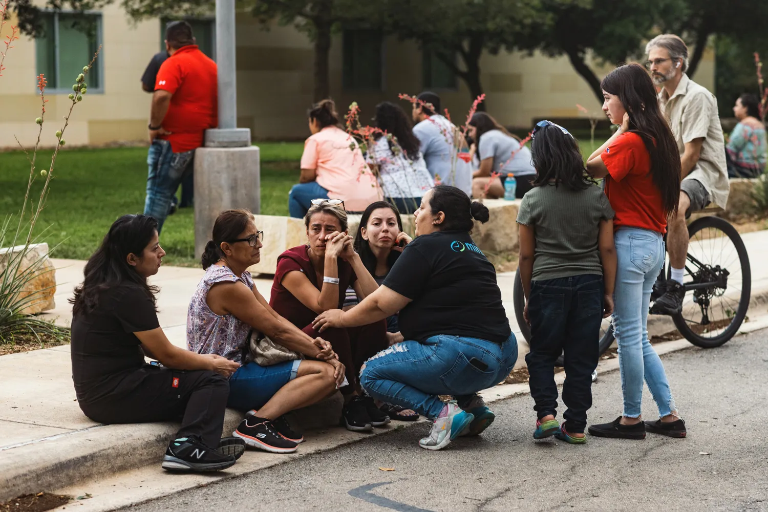 People grieve after the&nbsp;mass shooting at Robb Elementary School on May 24.