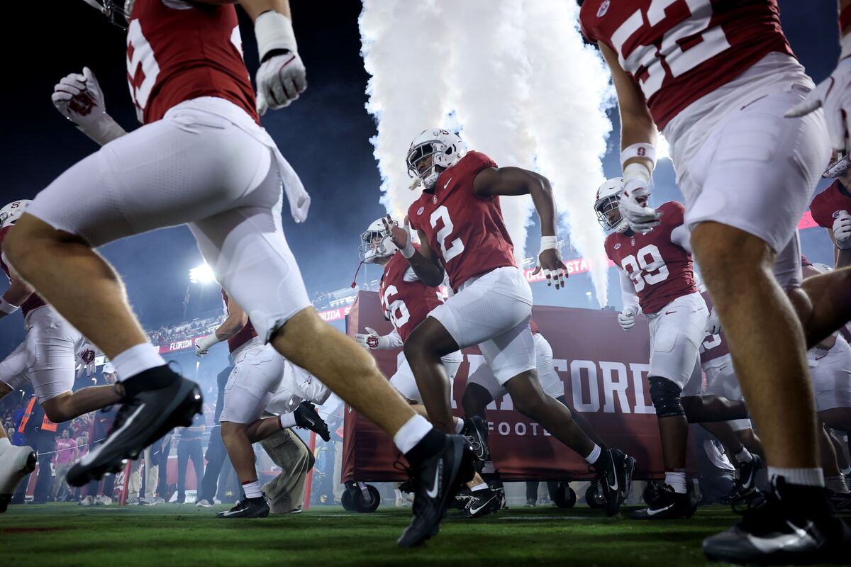 bloomberg.com - Janet Lorin - Stanford Agrees to Add DoorDash Patches to Athletic Uniforms