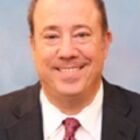 Headshot of John D Brefach