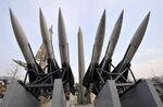 Replicas of a North Korean Scud-B missile (C-behind) and South Korean Hawk surface-to-air missiles (foreground) are seen at the Korean War Memorial in Seoul on February 17, 2011. Recent satellite images show that North Korea has completed a launch tower at its new missile base, a key step in efforts to test a missile which could eventually reach the United States, experts say. AFP PHOTO/JUNG YEON-JE (Photo credit should read JUNG YEON-JE/AFP/Getty Images)
