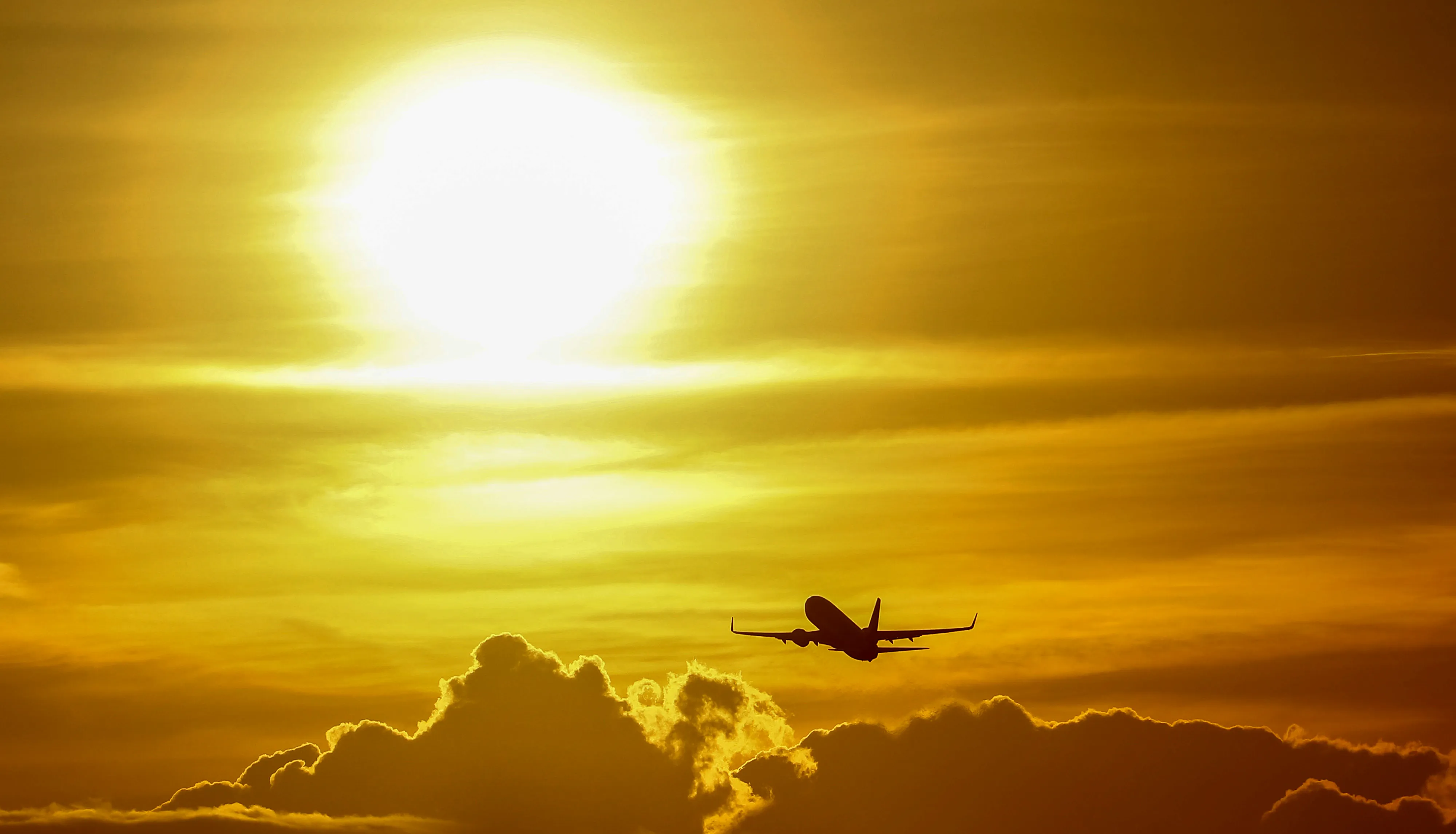 A passenger aircraft flies from Frankfurt Airport in Germany.