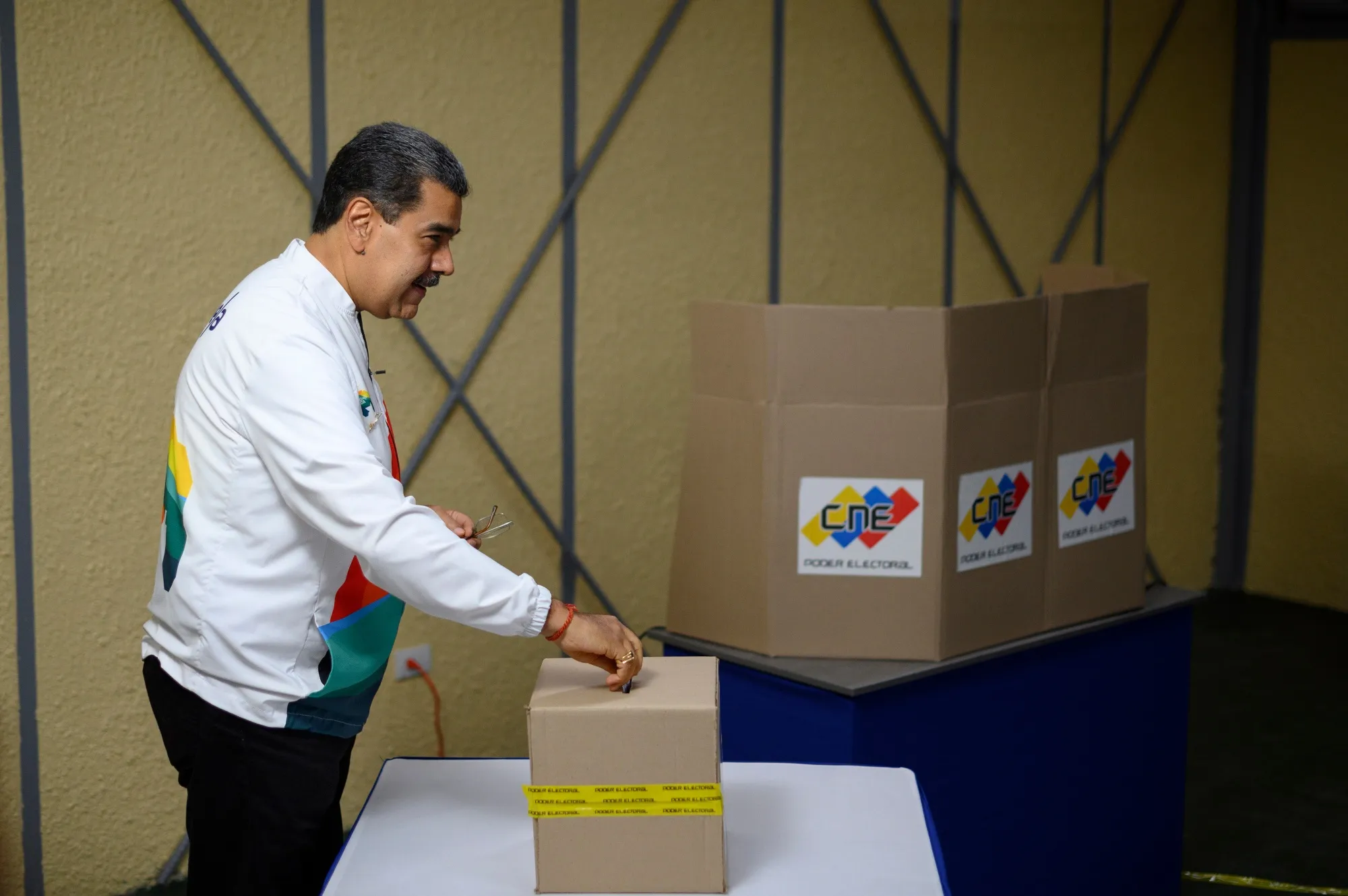 Nicolas Maduro casts a ballot during a referendum vote in Caracas, Venezuela on Dec. 3.