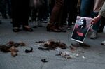 Women and men protest against the death of 22-year-old Iranian Mahsa Amini on October 1.&nbsp;