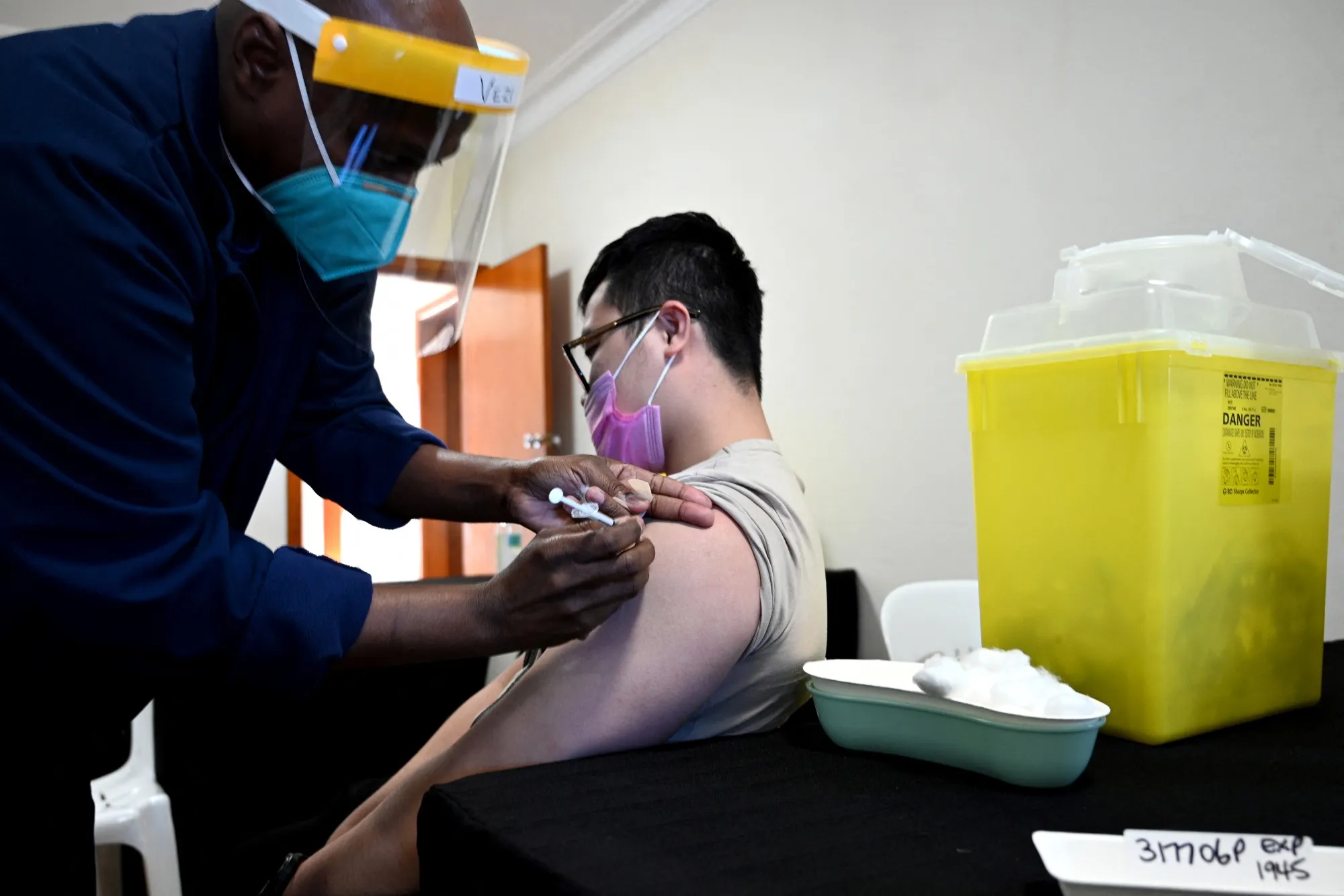 A resident receives his vaccine at a walk-in Covid-19 vaccination center in Sydney on Aug. 7.