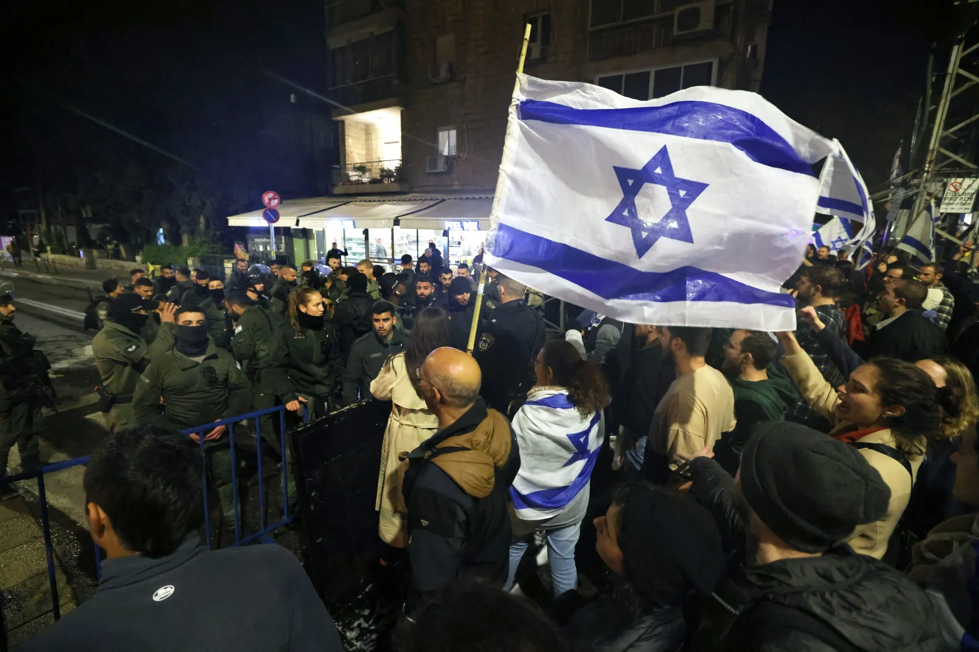 Demonstrators during a rally against the Israeli government's judicial reforms outside Benjamin Netanyahu's residence in Jerusalem, in March 2023.