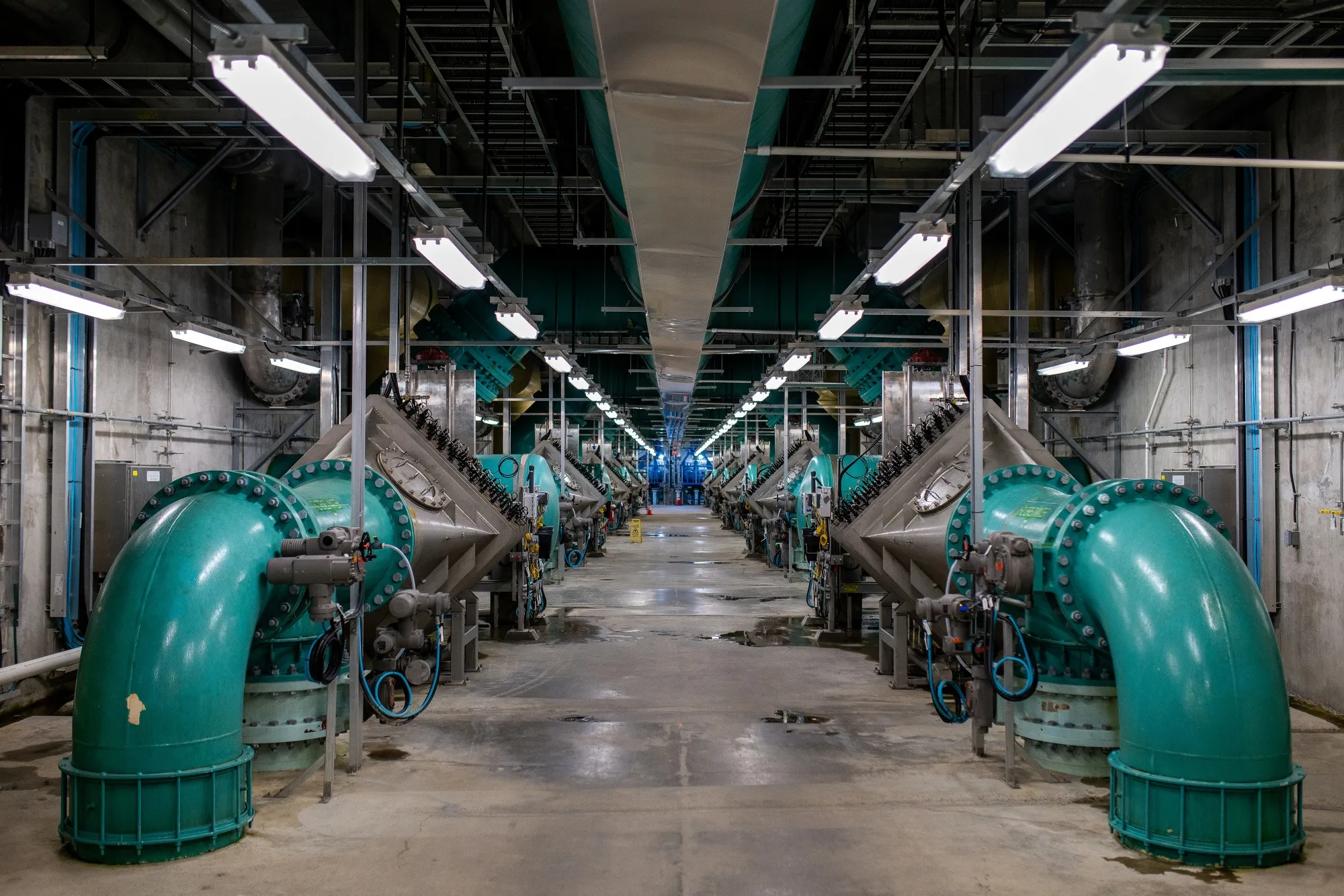 Pipes and UV reactors inside a water filtration plant.