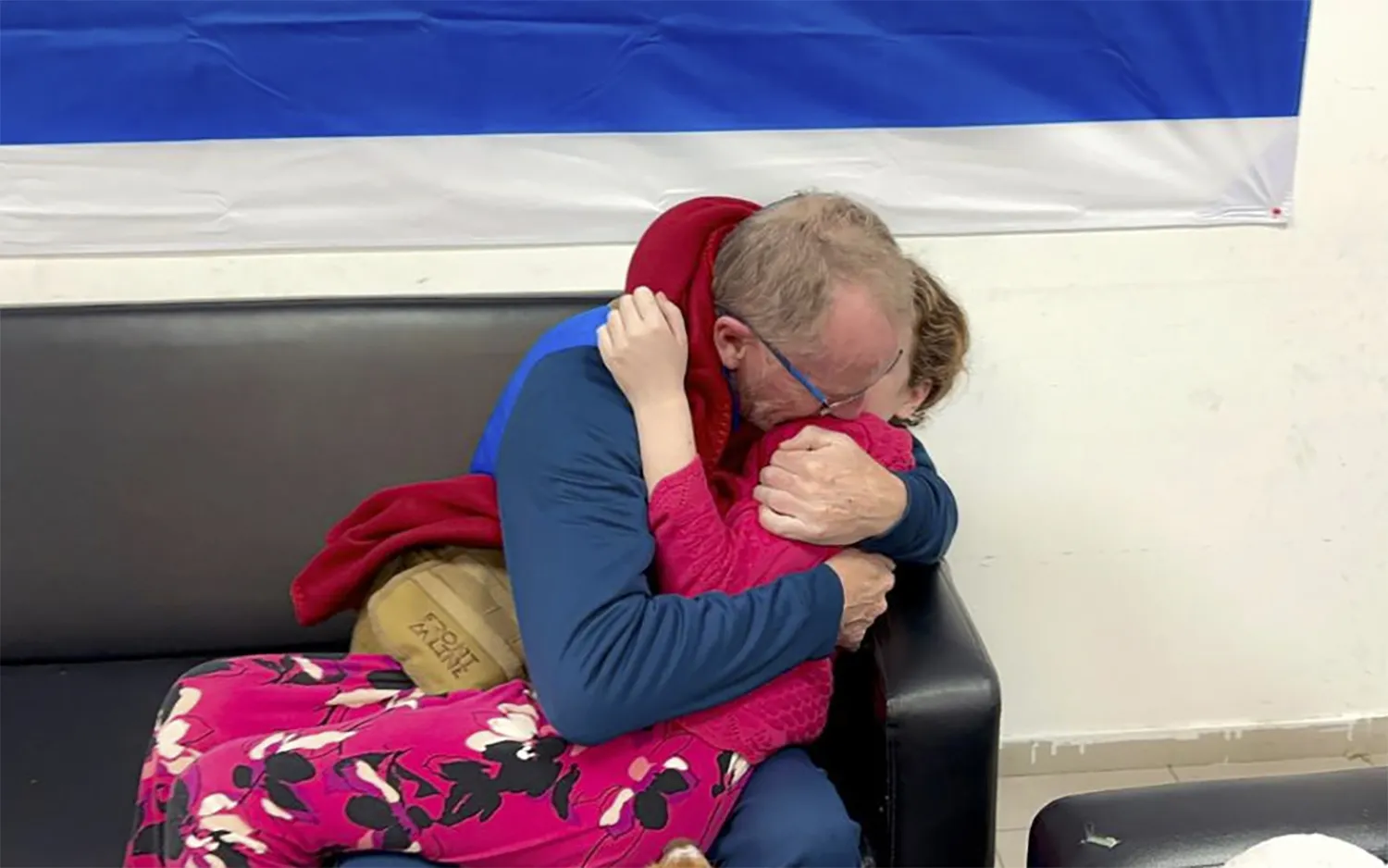 A released hostage&nbsp;reunites with her father&nbsp;in Israel, Nov. 26.