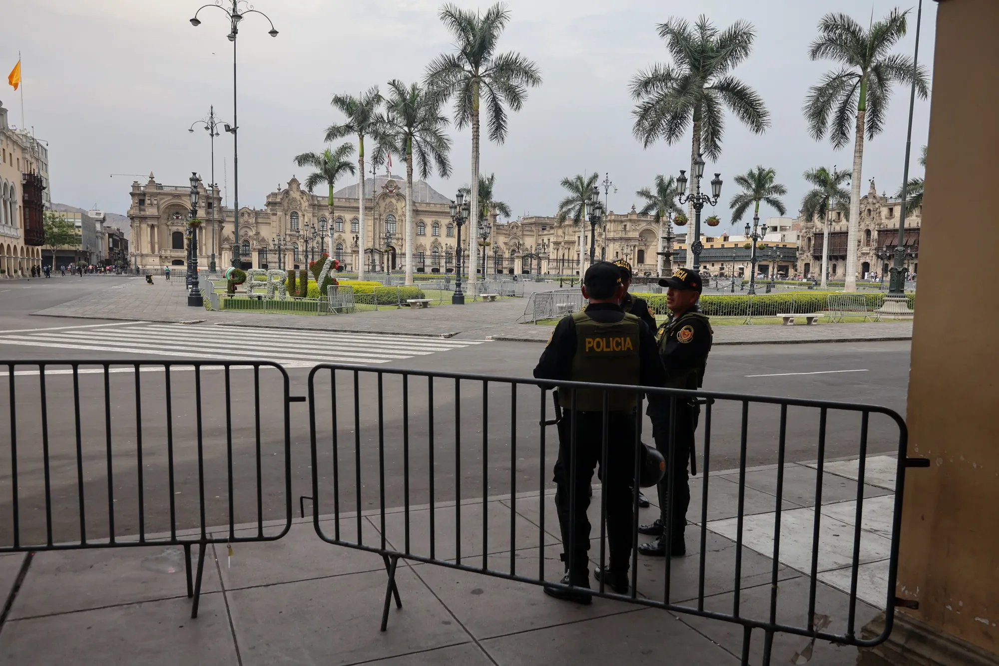 Law enforcement officers near the Government Palace in Lima.